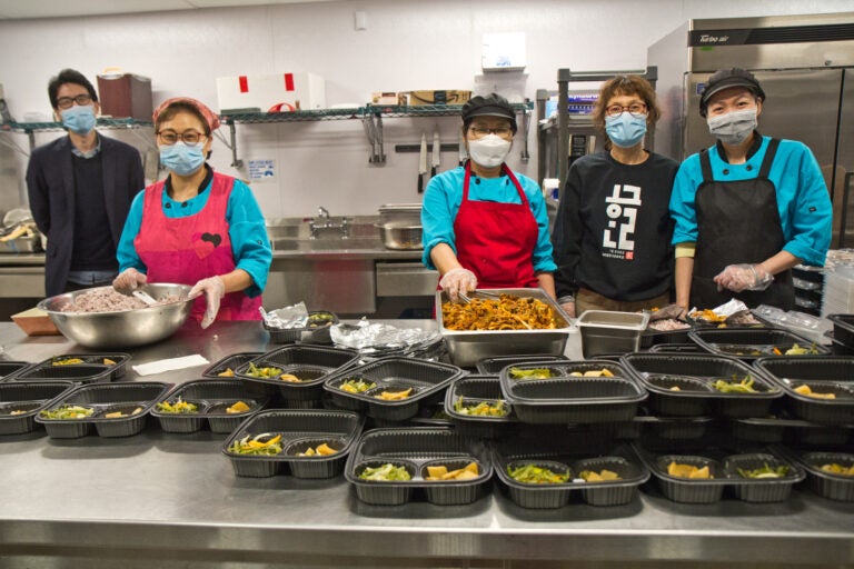 From left, PASSi managing director Ken Yang, chef Jeom Sun Cho, chef Okseo Okyeon, director Insook Seol, and chef Nguyet Tran. (Kimberly Paynter/WHYY)