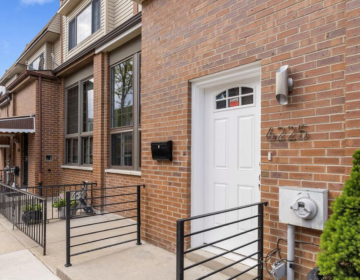 The brick exterior of 6225 Osage Avenue, one of the 36 homes destroyed in the MOVE bombing and newly renovated. (AJR Endeavors)