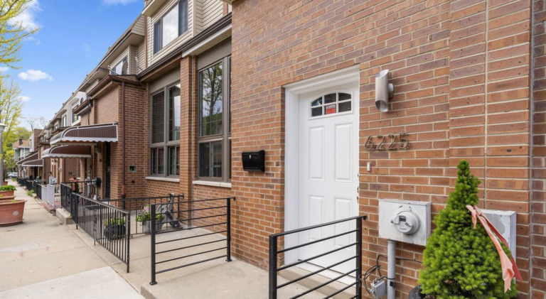 The brick exterior of 6225 Osage Avenue, one of the 36 homes destroyed in the MOVE bombing and newly renovated. (AJR Endeavors)