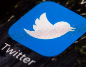 This April 26, 2017, file photo shows the Twitter app icon on a mobile phone in Philadelphia. (AP Photo/Matt Rourke)