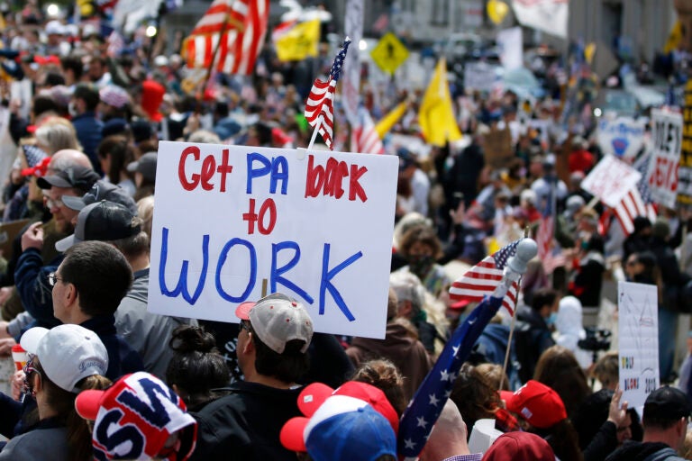 Protesters demonstrate at the state Capitol in Harrisburg, Pa., Monday, April 20, 2020, demanding that Gov. Tom Wolf reopen Pennsylvania's economy even as new social-distancing mandates took effect at stores and other commercial buildings. (AP Photo/Matt Slocum)