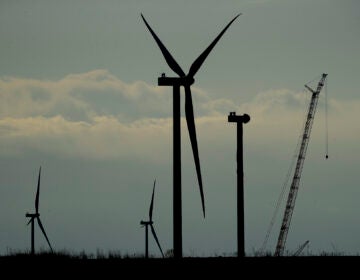 Wind turbines stand in various stages of completion at the Reading Wind Facility in Reading, Kan., on Thursday, April 23, 2020. (AP Photo/Charlie Riedel)