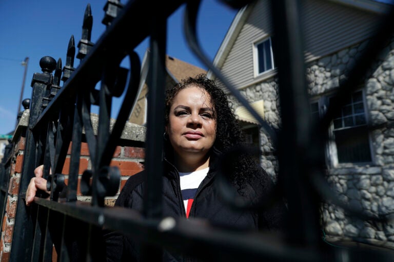 Nelis Rodriguez poses at her home in Chicago, Thursday, May 7, 2020. (AP Photo/Nam Y. Huh)