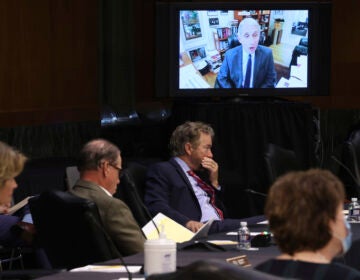 Senators listen as Dr. Anthony Fauci, director of the National Institute of Allergy and Infectious Diseases, speaks remotely during a virtual Senate Committee for Health, Education, Labor, and Pensions hearing.