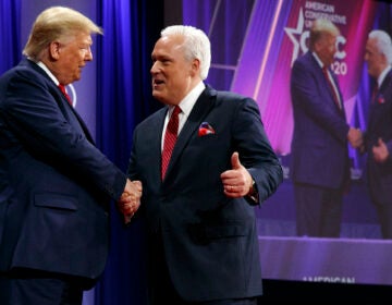 In this Feb. 29, 2020, file photo, President Donald Trump is greeted by Matt Schlapp, Chairman of the American Conservative Union, as the president arrives to speak at the Conservative Political Action Conference,  at National Harbor, in Oxon Hill, Md. (AP Photo/Jacquelyn Martin, File)