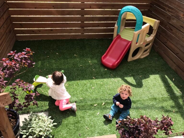 Danielle and Wil Rivera’s 19-month-old twins play in their newly decorate backyard. (Courtesy of Danielle Rivera)