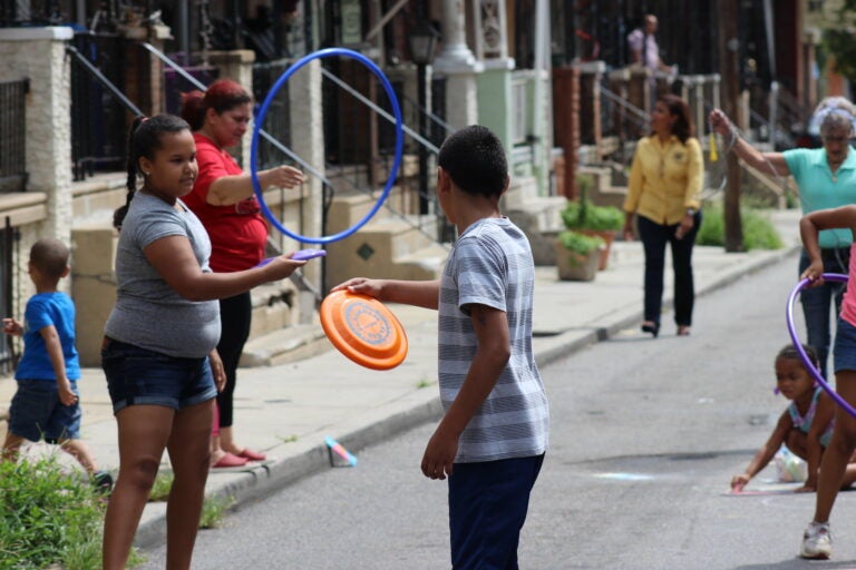 Families play on a North Philadelphia Playstreet in a 2018 photo. (Courtesy of the City of Philadelphia)