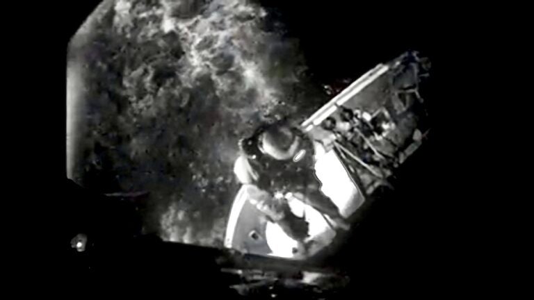 A screen capture from a U.S. Coast Guard video of the successful hoisting of two people from a grounded fishing vessel in the Barnegat Inlet Wednesday night. (U.S. Coast Guard)