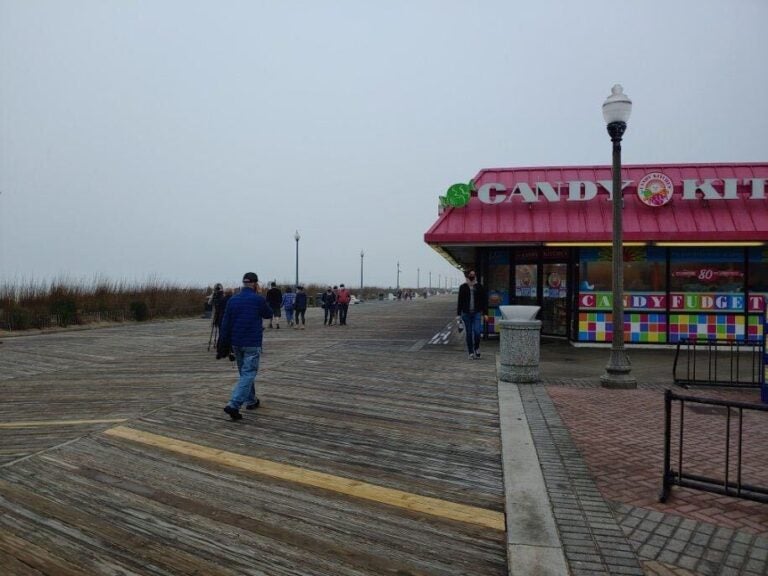 Few people were walking along the Rehoboth Beach boardwalk just hours before the state’s beaches reopened Friday at 5 p.m. (Zoë Read/ WHYY)