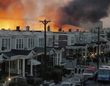 In this May, 1985 file photo, scores of rowhouses burn in a fire in the west Philadelphia neighborhood. Police dropped a bomb on the militant group MOVE's home on May 13, 1985 in an attempt to arrest members, leading to the burning of scores of homes in the neighborhood. (AP Photo, File)