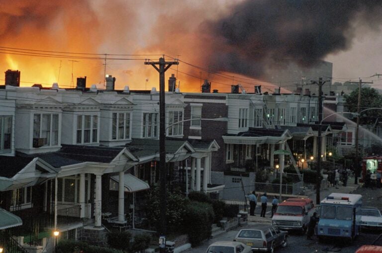 In this May, 1985 file photo, scores of rowhouses burn in a fire in the west Philadelphia neighborhood. Police dropped a bomb on the militant group MOVE's home on May 13, 1985 in an attempt to arrest members, leading to the burning of scores of homes in the neighborhood. (AP Photo, File)