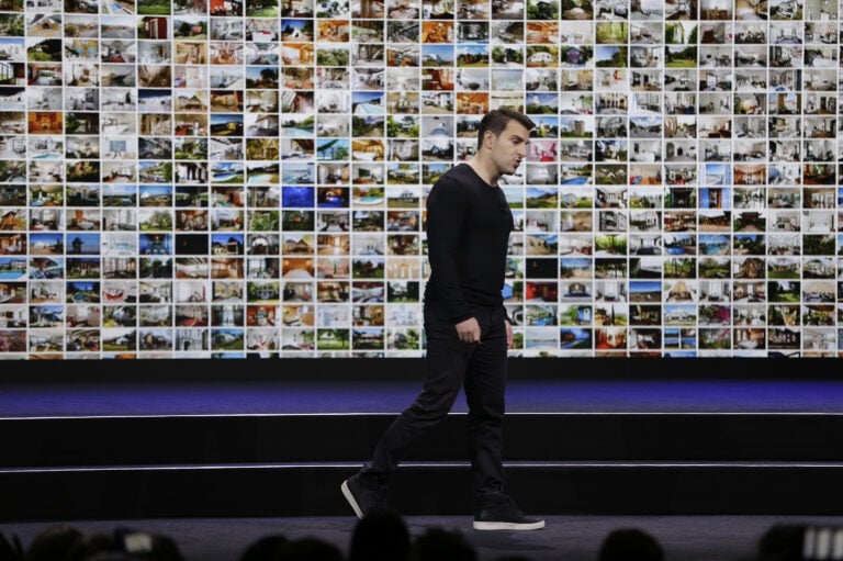 Airbnb co-founder and CEO Brian Chesky during an event in 2018. On Tuesday, the company announced it is laying off 1,900 employees, or about a quarter its workforce, as the coronavirus rattles the travel industry. (Eric Risberg/AP Photo)