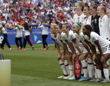 Players line up for a photo prior to the Women's World Cup final between the U.S. and the Netherlands in Décines, outside Lyon, France, on July 7, 2019. The U.S. team won 2-0 for its fourth World Cup title. (Alessandra Tarantino/AP Photo)