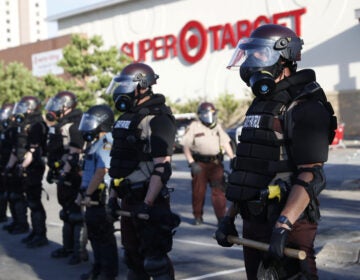 Minnesota State Police formed a barricade in front of a Target store in the city of St. Paul.