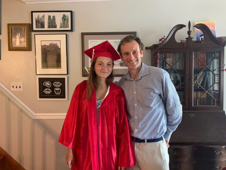 Senior Grace Honeyman and her father, Tom Honeyman, prepare to attend a virtual graduation event at Harriton High School in Lower Merion Township. (Photo by Kate Honeyman)