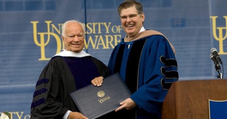Wayne Craven (left) received an honorary Doctor of Humane Letters degree from Board of Trustees Chair Howard Cosgrove at University of Delaware's 2008 commencement ceremony. The citation called Dr. Craven a 'champion of American art' and a 'fluent and graceful teacher.' (University of Delaware)