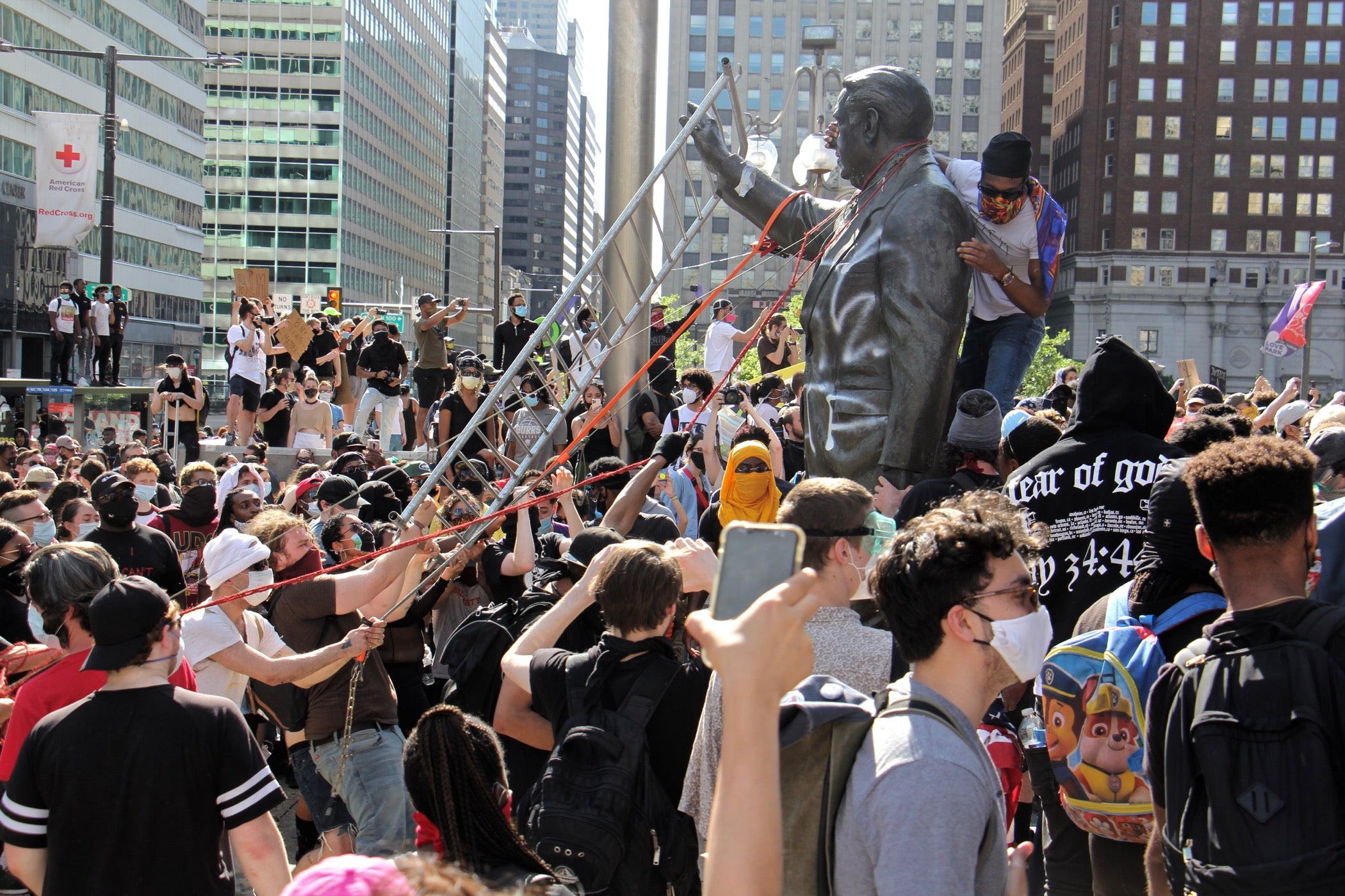 Protesters try to take down the statue of former mayor and police chief Frank Rizzo