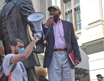 Philadelphia NAACP President Rodney Muhammad speaks at a peaceful protest at City Hall. (Kimberly Paynter/WHYY)
