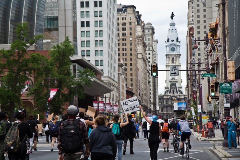 Protesters marched through Center City Philadelphia in June chanting 'George Floyd' and 'Breonna Taylor,' while advocating for their justice. (Kimberly Paynter/WHYY)