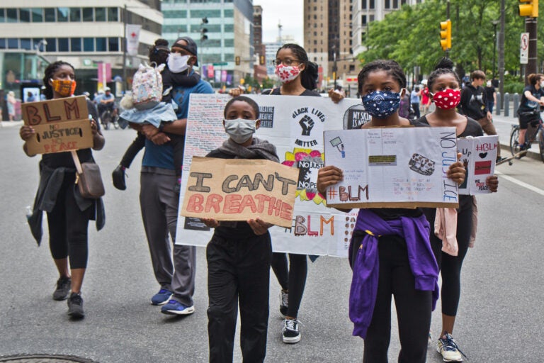 The Cobb family came to City Hall from their home in North Philadelphia to demand justice for George Floyd and others who lost their lives at the hands of police. (Kimberly Paynter/WHYY)