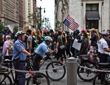 Protesters march through Center City