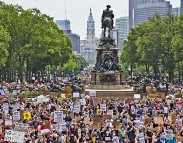 Protesters took over the Benjamin Franklin Parkway Saturday to hear speakers from the Party for Socialism and Liberation - Philly, who along with demanding an end to police brutality and justice for George Floyd, called for fair housing, libraries, and healthcare for all. (Kimberly Paynter/WHYY)