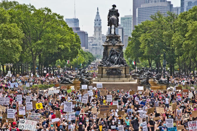 Protesters took over the Benjamin Franklin Parkway Saturday to hear speakers from the Party for Socialism and Liberation - Philly, who along with demanding an end to police brutality and justice for George Floyd, called for fair housing, libraries, and healthcare for all. (Kimberly Paynter/WHYY)