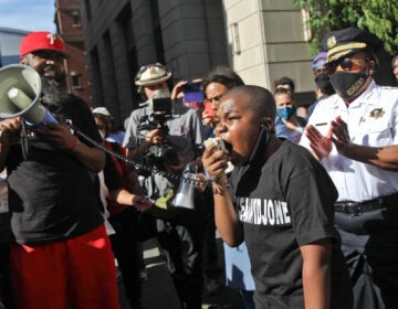 Isaac Gardner, 11, joined chief defender Keir Bradford-Grey and Philadelphia County Sheriff Rochelle Bilal in protest of the Black lives lost to police brutality. (Kimberly Paynter/WHYY)