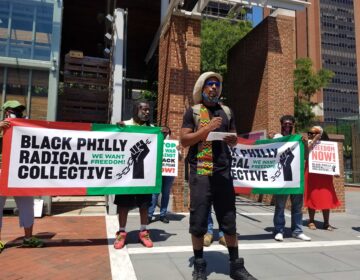 Mike Africa, Jr., reading list of demands as part of the Black Philly Radical Collective. (Peter Crimmins / WHYY)