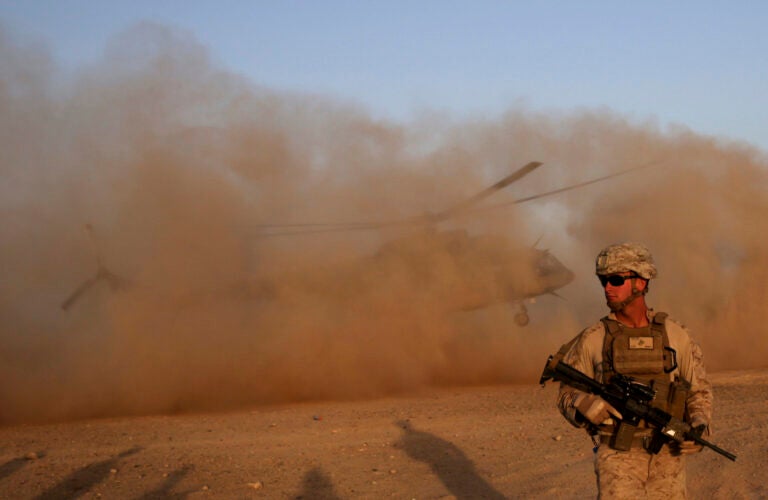 In this Aug. 27, 2017 file photo, a U.S. Marine takes part during a training session for Afghan army commandos in Shorab military camp in Helmand province, Afghanistan. (AP Photo/Massoud Hossaini, File)