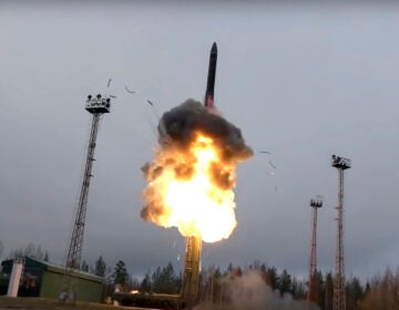 In this photo an intercontinental ballistic missile lifts off from a truck-mounted launcher somewhere in Russia. The Russian military said the Avangard hypersonic weapon entered combat duty. The Kremlin has made modernization of Russia's strategic nuclear forces one of its top priorities. (Russian Defense Ministry Press Service via AP)