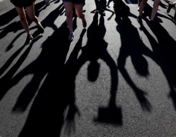 Protesters raise their hands as they march over the deaths of George Floyd and Breonna Taylor, Monday, June 1, 2020, in Louisville, Ky. Breonna Taylor, a black woman, was fatally shot by police in her home in March.  (AP Photo/Darron Cummings)