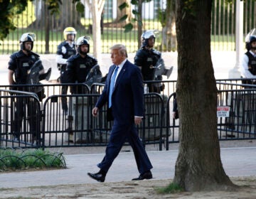 President Donald Trump walks in Lafayette Park to  visit outside St. John's Church across from the White House Monday, June 1, 2020, in Washington. Part of the church was set on fire during protests on Sunday night. (AP Photo/Patrick Semansky)