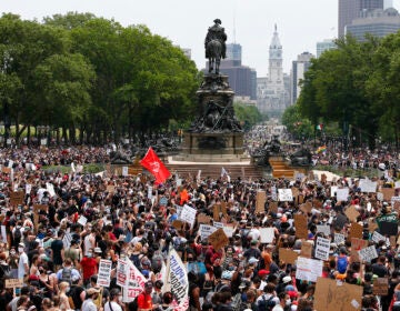 Demonstrators march to City Hall during a protest, Saturday, June 6, 2020 in Philadelphia over the death of George Floyd, a black man who was in police custody in Minneapolis. Floyd died after being restrained by Minneapolis police officers on May 25. (Yong Kim/The Philadelphia Inquirer via AP)