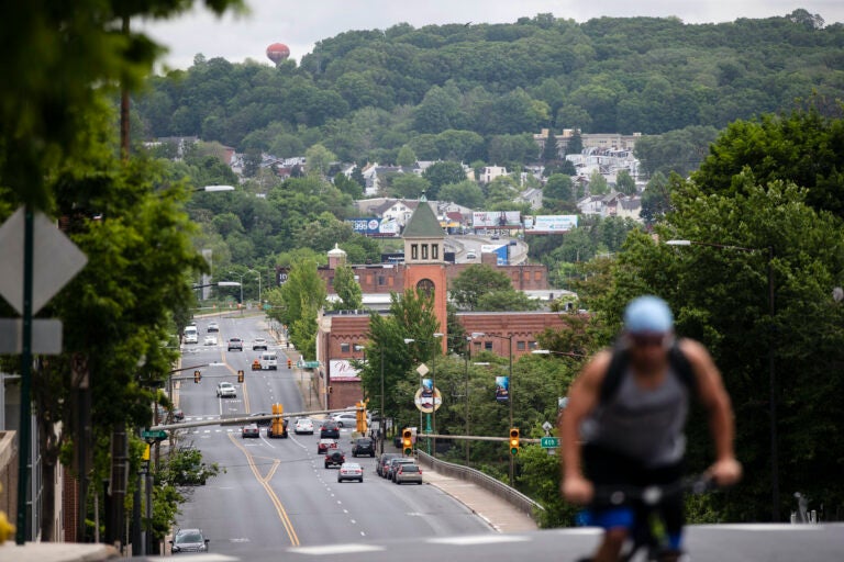 File photo: A cyclist peddles up a hill in Allentown, Pa., on Friday, May 29, 2020. (AP Photo/Matt Rourke)