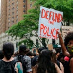 Protesters march against police brutality