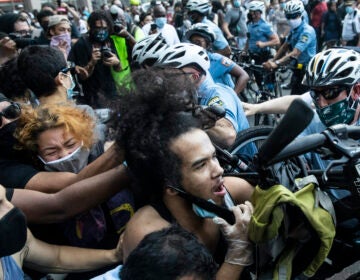 Police and protesters clash in Philadelphia