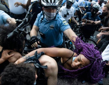 Police and protesters in Philadelphi