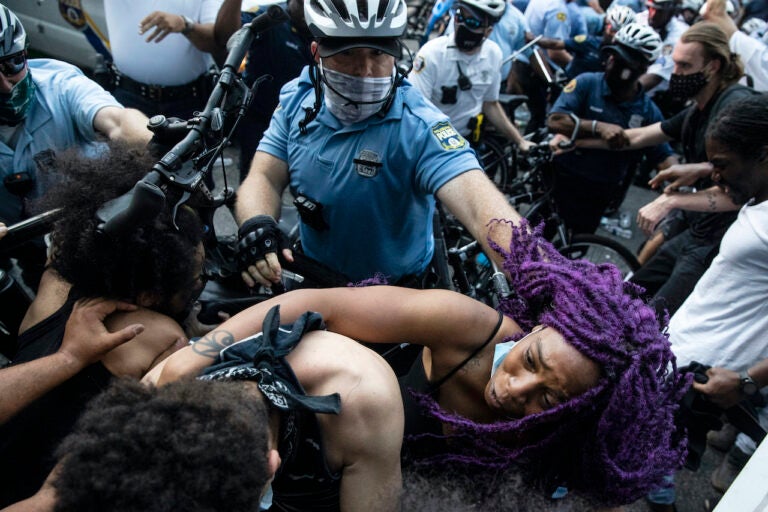 Police and protesters in Philadelphi