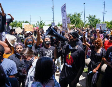 Protesters march, Saturday, June 13, 2020, in Palmdale, Calif.