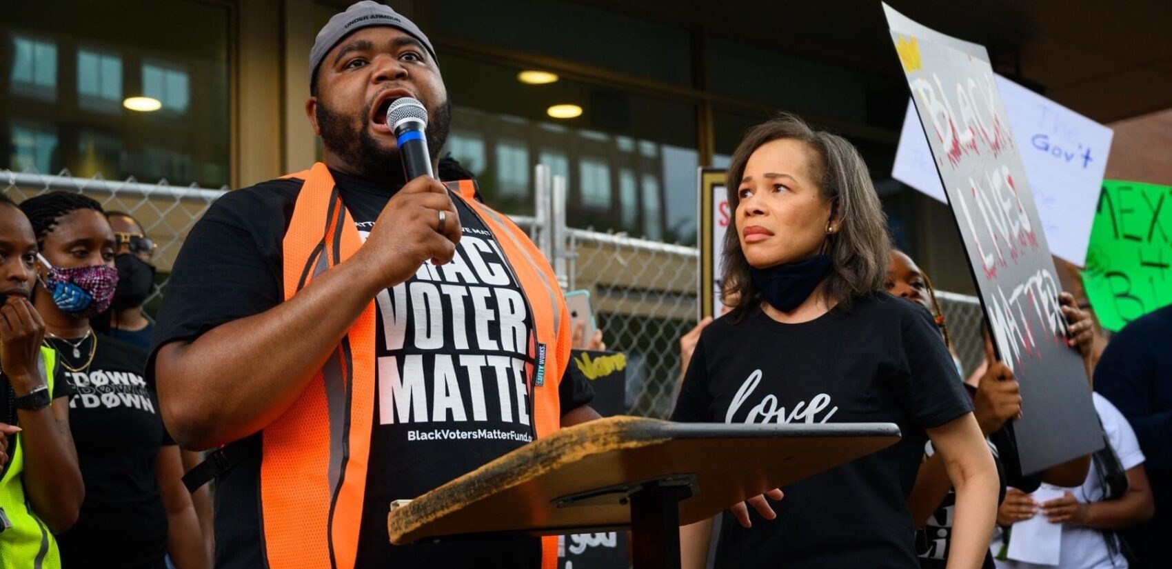 Organizer Coby Owens, joined by U.S. Rep. Lisa Blunt Rochester at a Wilmington protest in June, says the use of deadly force law needs to be amended or scrapped. (Courtesy of Coby Owens)