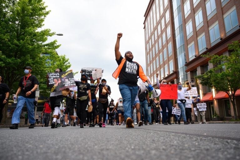 Coby Owens leads marchers through Wilmington during a protest that was peaceful from start to finish. (Courtesy of Coby Owens)