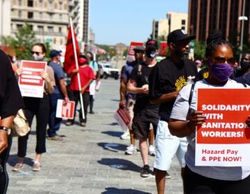 Labor union members including teachers and librarians joined a solidarity protest for the conditions of sanitation workers in the city of Philadelphia.(Kimberly Paynter/WHYY)