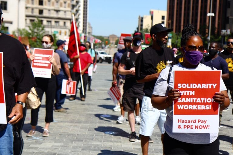 Labor union members including teachers and librarians joined a solidarity protest for the conditions of sanitation workers in the city of Philadelphia.(Kimberly Paynter/WHYY)