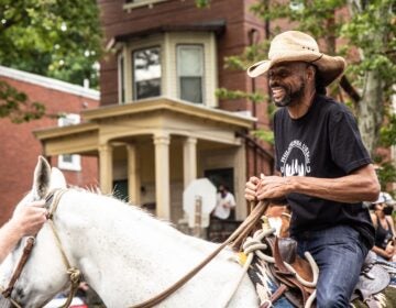 Al Lynch rode his horse to Malcolm X Park from North Philadelphia to celebrate Juneteenth. (Kimberly Paynter/WHYY)