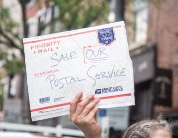 The American Postal Workers union local 89 and other labor supporters protest in Old City demanding the postal service be fully funded. (Kimberly Paynter/WHYY)