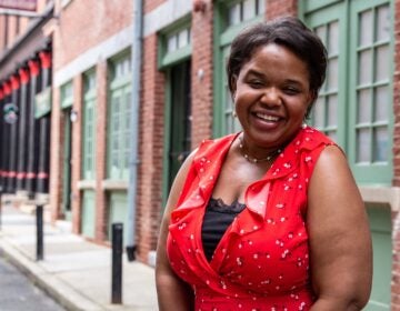 Writer Talia Stinson out in her Old City neighborhood (Kimberly Paynter/WHYY).