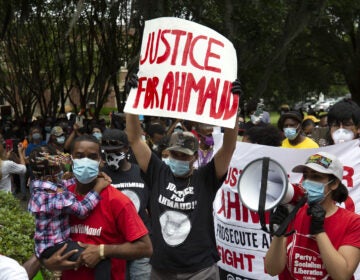 The death of Ahmaud Arbery, who was killed while jogging in February, 2020, prompted renewed calls for Georgia to pass a hate crimes law. Gov. Brian Kemp signed House Bill 426 on Friday, giving the state its first hate crime law in 16 years. (Stephen B. Morton/AP Photo)