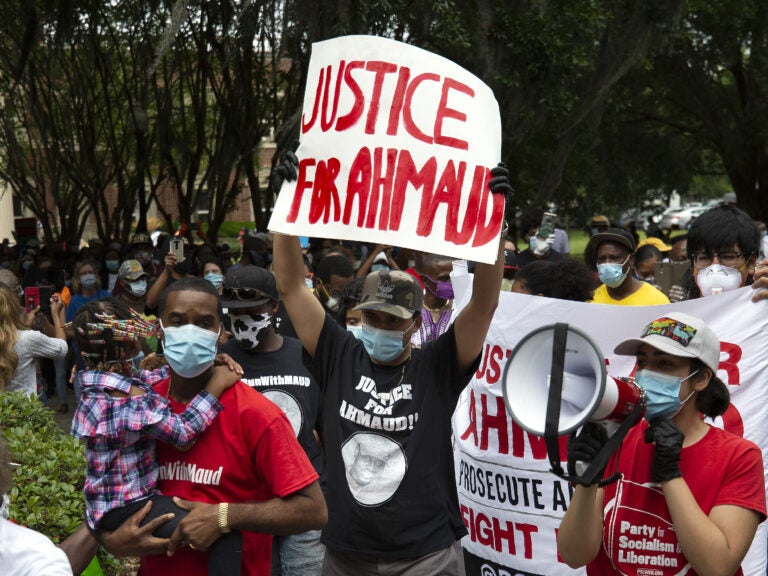 The death of Ahmaud Arbery, who was killed while jogging in February, 2020, prompted renewed calls for Georgia to pass a hate crimes law. Gov. Brian Kemp signed House Bill 426 on Friday, giving the state its first hate crime law in 16 years. (Stephen B. Morton/AP Photo)