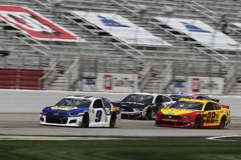 Chase Elliott (9), Aric Almirola (10) and Joey Logano (22) drive during a NASCAR Cup Series race Sunday at Atlanta Motor Speedway on Hampton, Ga. On Wednesday, NASCAR announced a ban of the Confederate battle flag. Chase Elliott (9), Aric Almirola (10) and Joey Logano (22) drive during a NASCAR Cup Series auto race at Atlanta Motor Speedway on Sunday in Hampton, Ga. On Wednesday, NASCAR announced a ban of the Confederate battle flag at all of its events and properties. (Brynn Anderson/AP Photo)